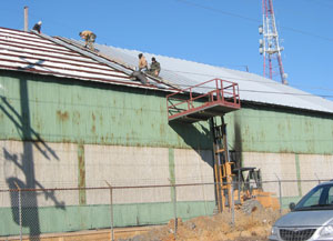 METAL BUILDING RE-ROOFING WAREHOUSE